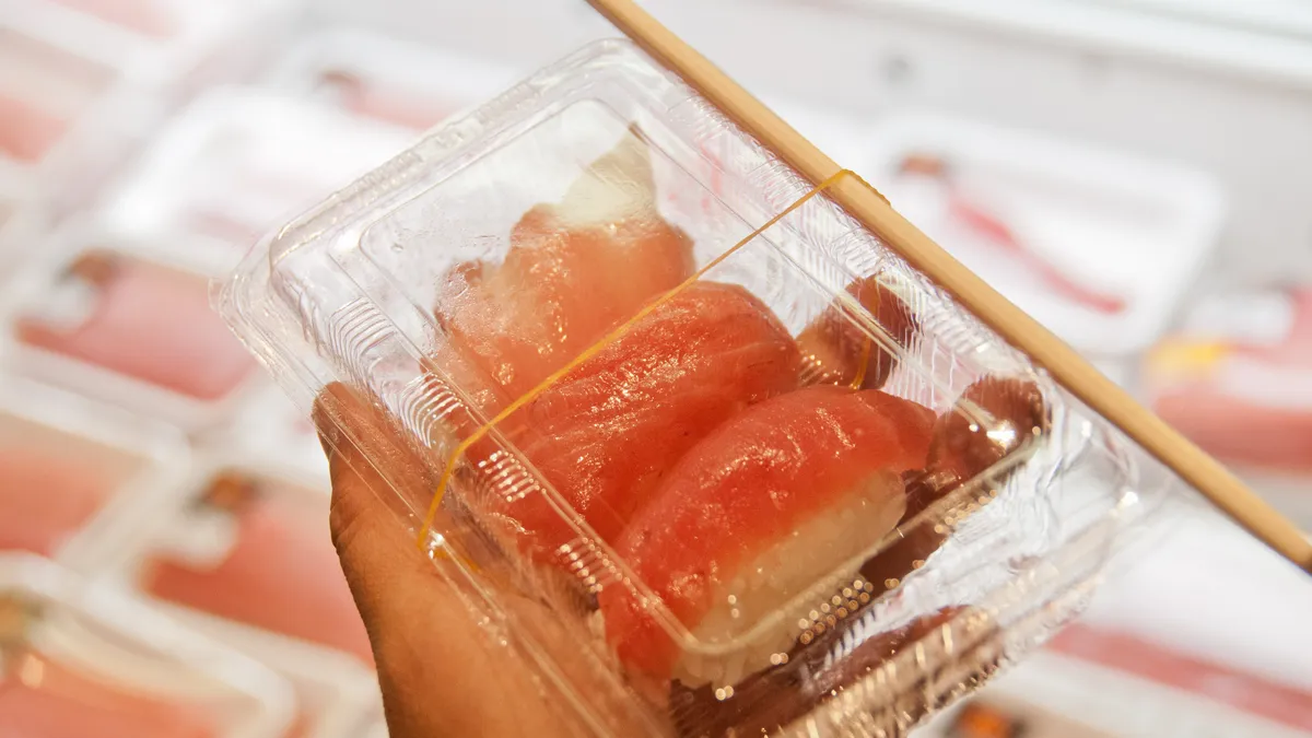 Famous fresh raw Japanese tuna sushi in a box