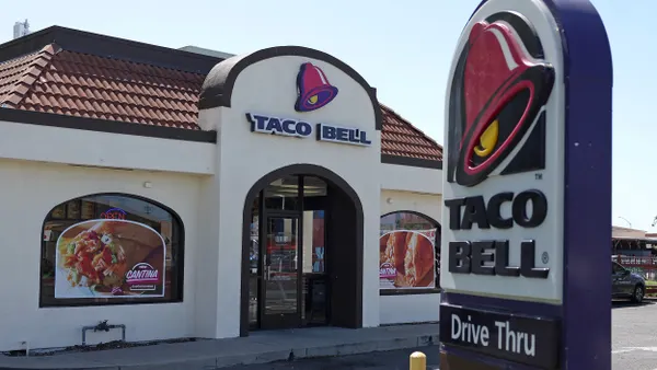A sign is posted in front of a Taco Bell restaurant on May 01, 2024 in Richmond, California.