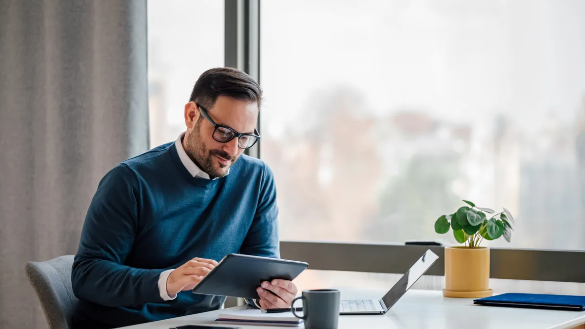 Businessman using tablet