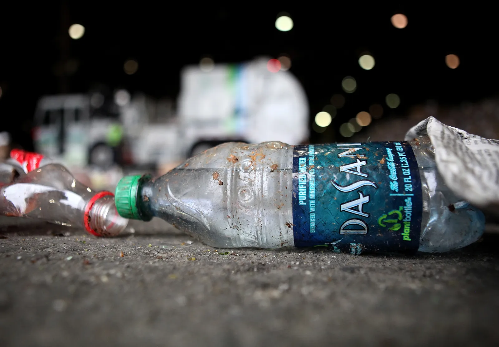 Plastic bottle on floor of recycling facility