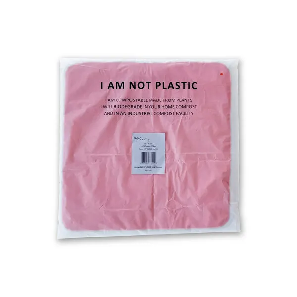 A pink, folded piece of clothing inside a semi-transparent package.