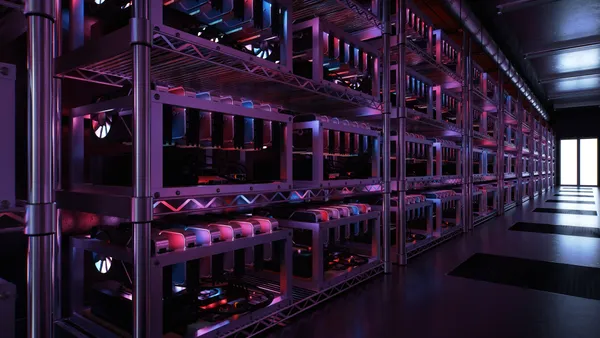 Inside a data center for cryptocurrency mining with endless racks of CPU and motherboards.