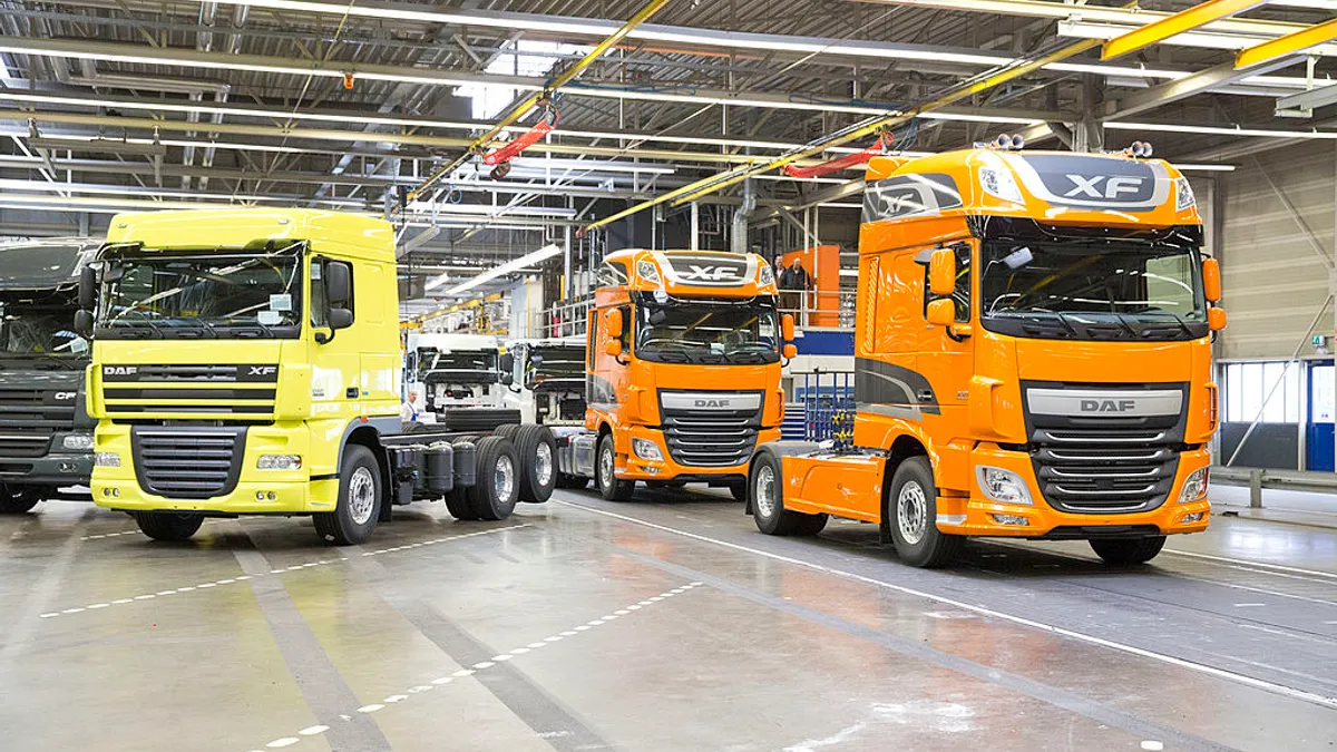 Multicolored DAF trucks are in a production facility in 2013 in the Netherlands.