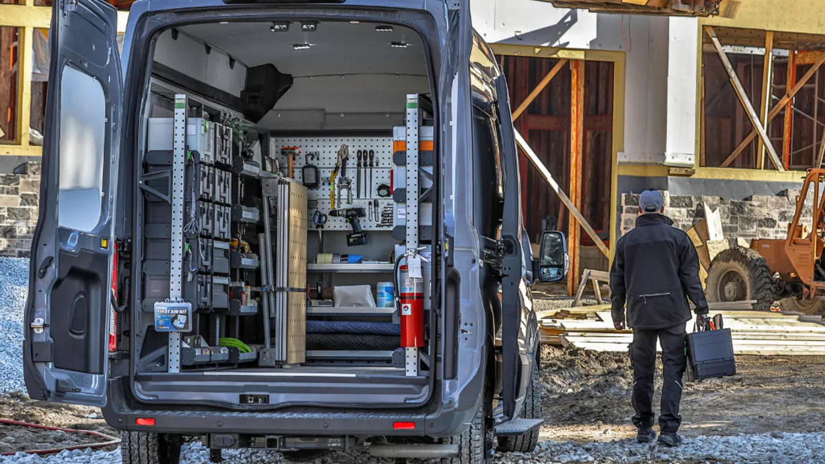 Man walking near work truck