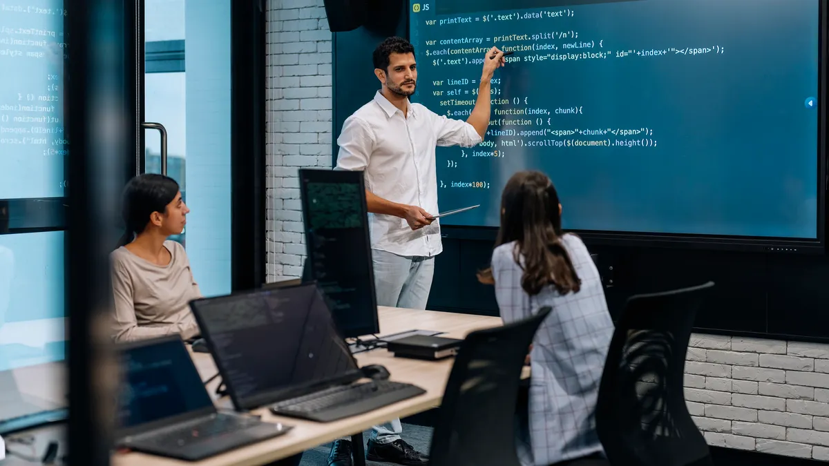 Software developer team working together