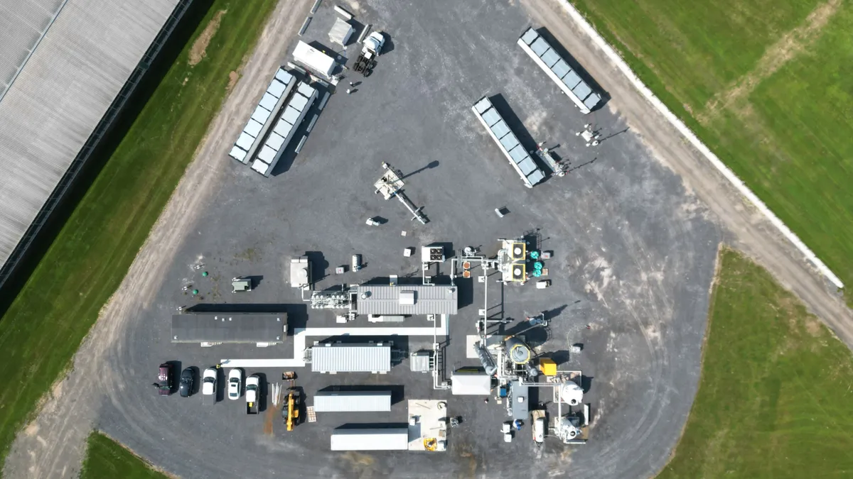 Overhead view of industrial facility surrounded by fields.