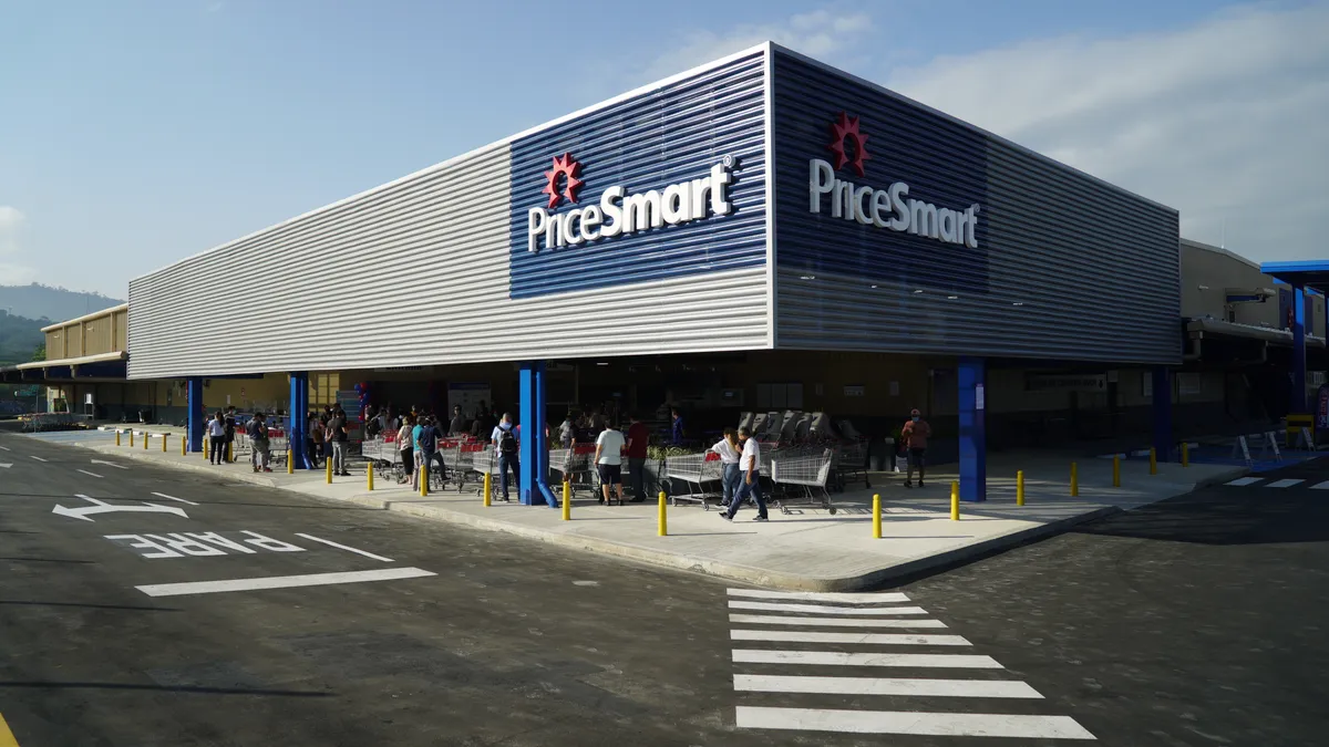 People outside a PriceSmart retail store.