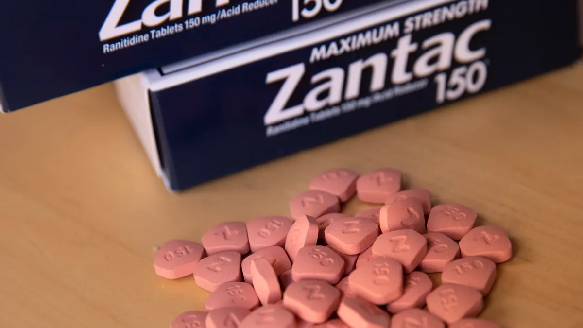 In this photo illustration, packages and pills of Zantac sit on a table on September 19, 2019 in New York City.