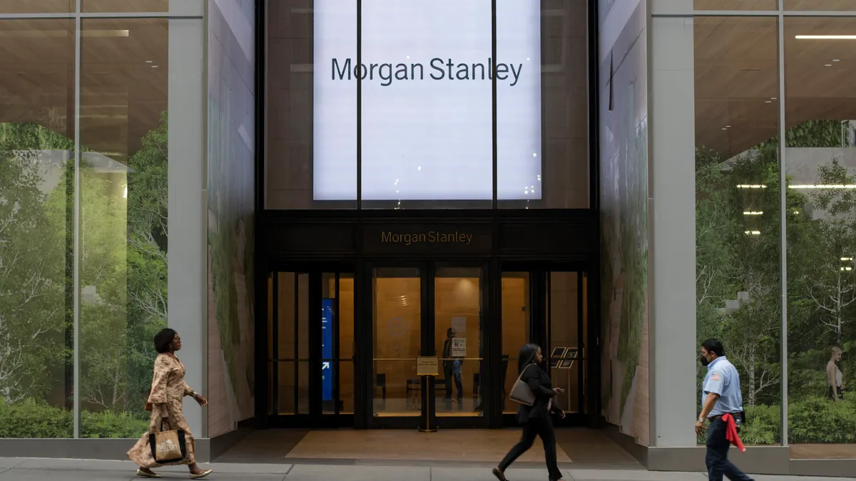 People walk past Morgan Stanley's 522 Fifth Avenue Branch in Midtown Manhattan on July 7, 2022.