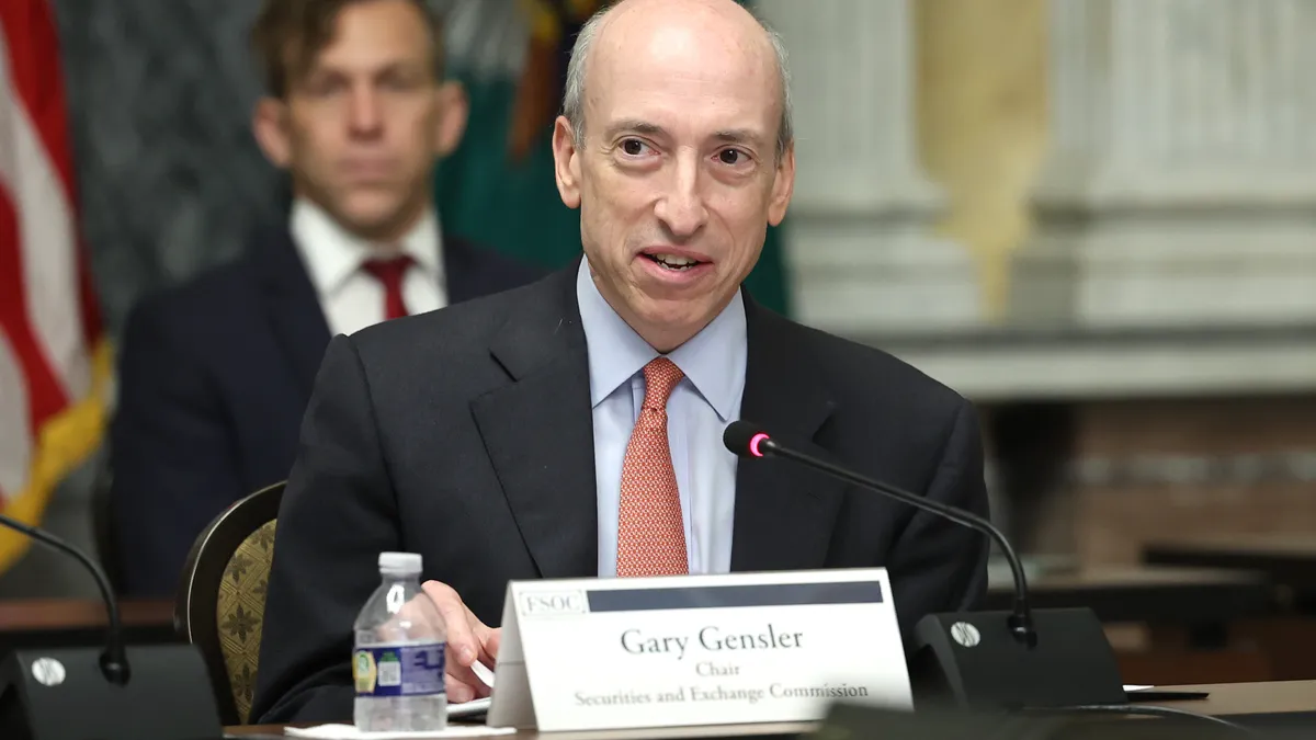 SEC Chairman Gary Gensler participates in a meeting.