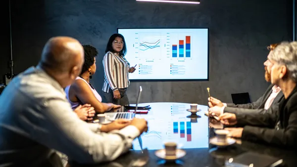 Businesswoman doing a presentation in a meeting at the office