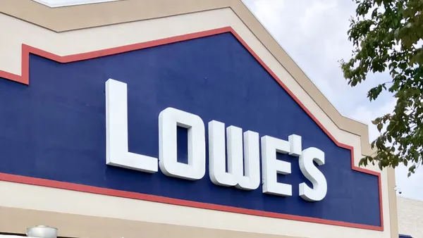 A Lowe's storefront with the company's blue and white signage