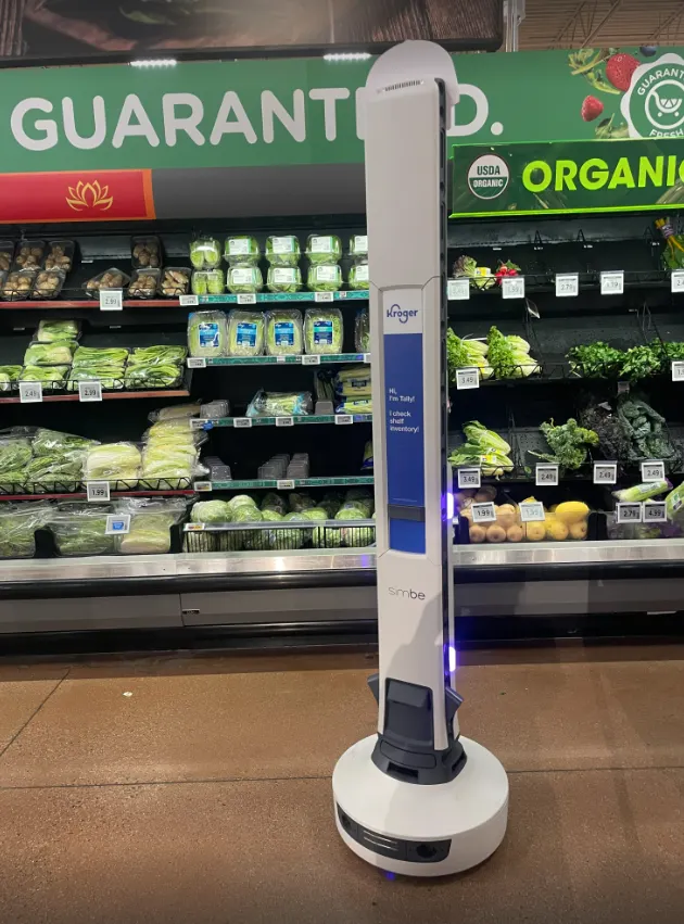 Tally, an aisle-scanning robot piloted by Kroger, is seen in front of produce at a Kroger store in The Colony, Texas, on March 1, 2026.