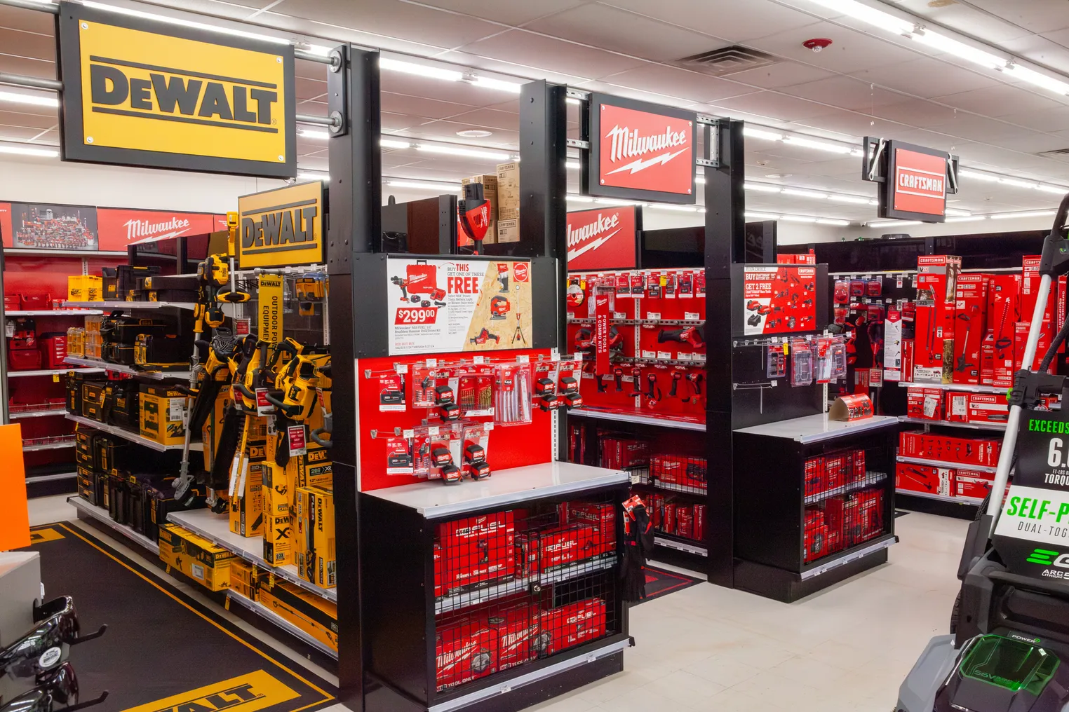 DeWalt, Milwaukee and Craftsman tool displays in an Ace Hardware store