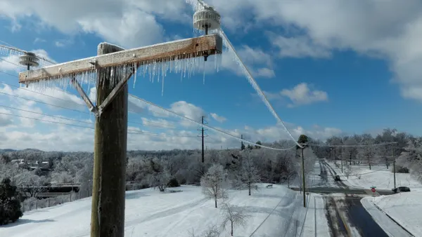 Power lines in the snow following Winter Storm Fern.