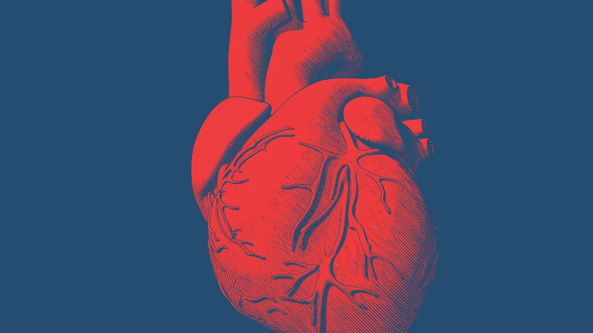 Red human heart drawing on blue background