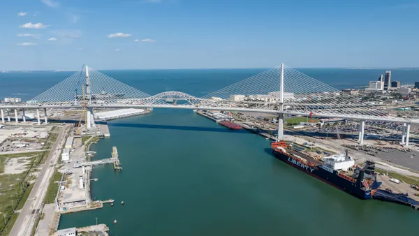 The new Harbor Bridge in Corpus Christi, Texas, with two cable-stayed towers stretches across a body of water.