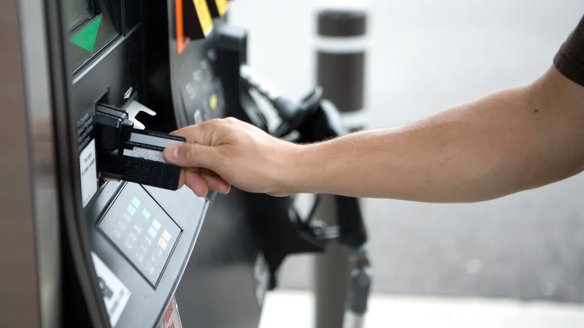 Making a card transaction at a gas pump