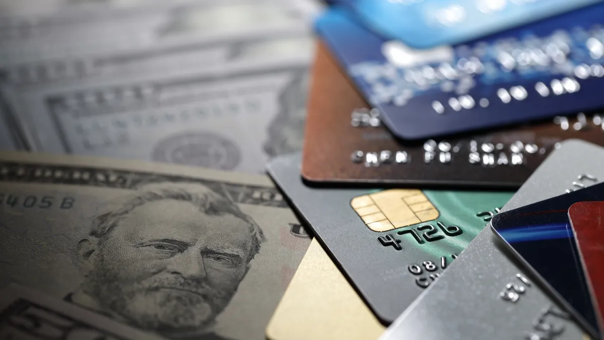 Close-up image of cash and credit cards