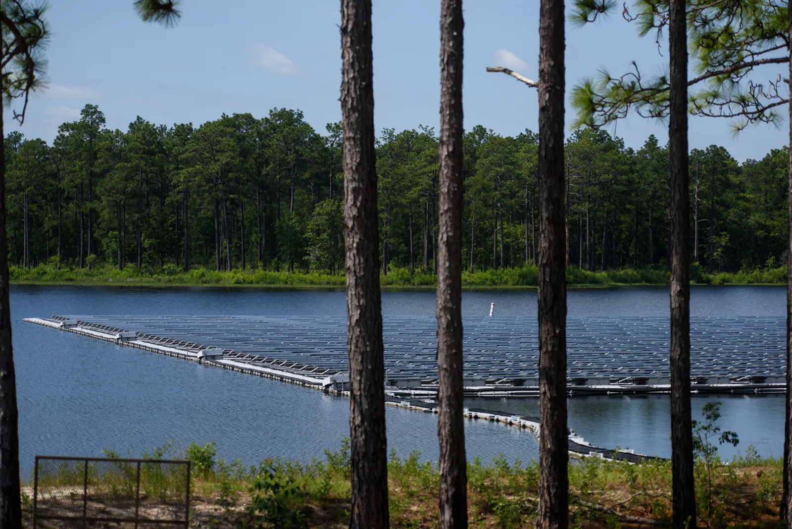 A 1.1 MW floating solar panel system, deployed on Big Muddy Lake at Camp Mackall in North Carolina in 2022.