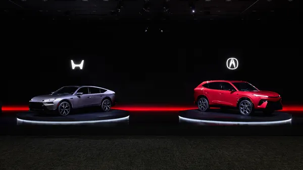 The Honda Hybrid Sedan, Acura Hybrid SUV on display during a Honda Motor Co. business briefing in Japan.