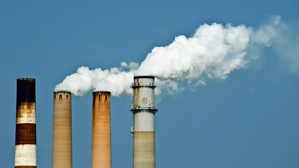 Smoke streaming from the smokestacks of the TECO Big Bend coal-fired power plant in Apollo Beach, Florida