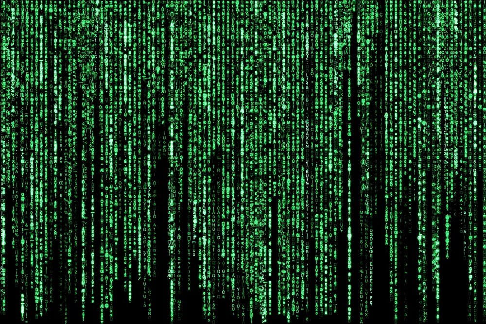 Matrix background of blurred programming code.