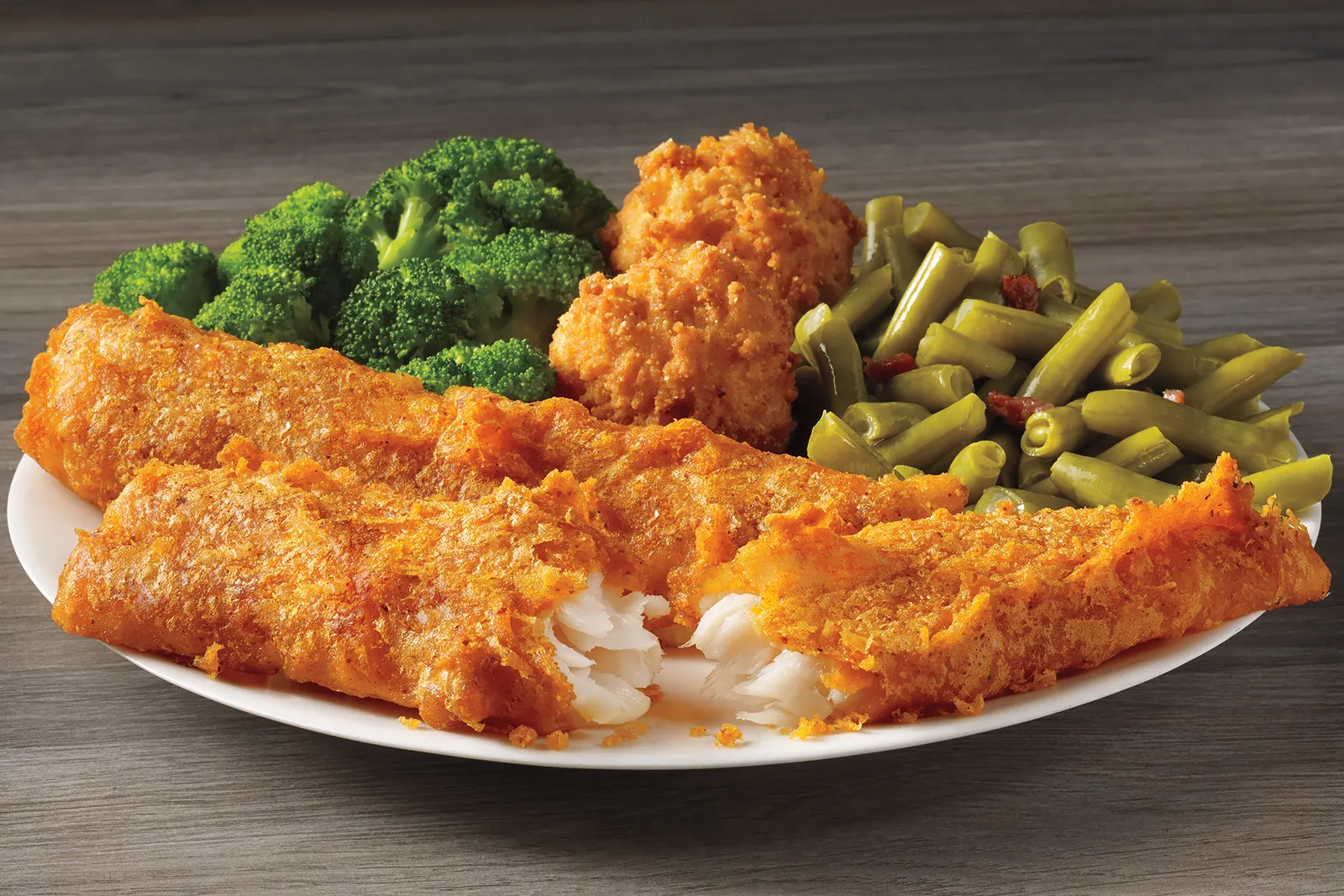 A photograph of a two piece spicy fish menu item from Captain D's