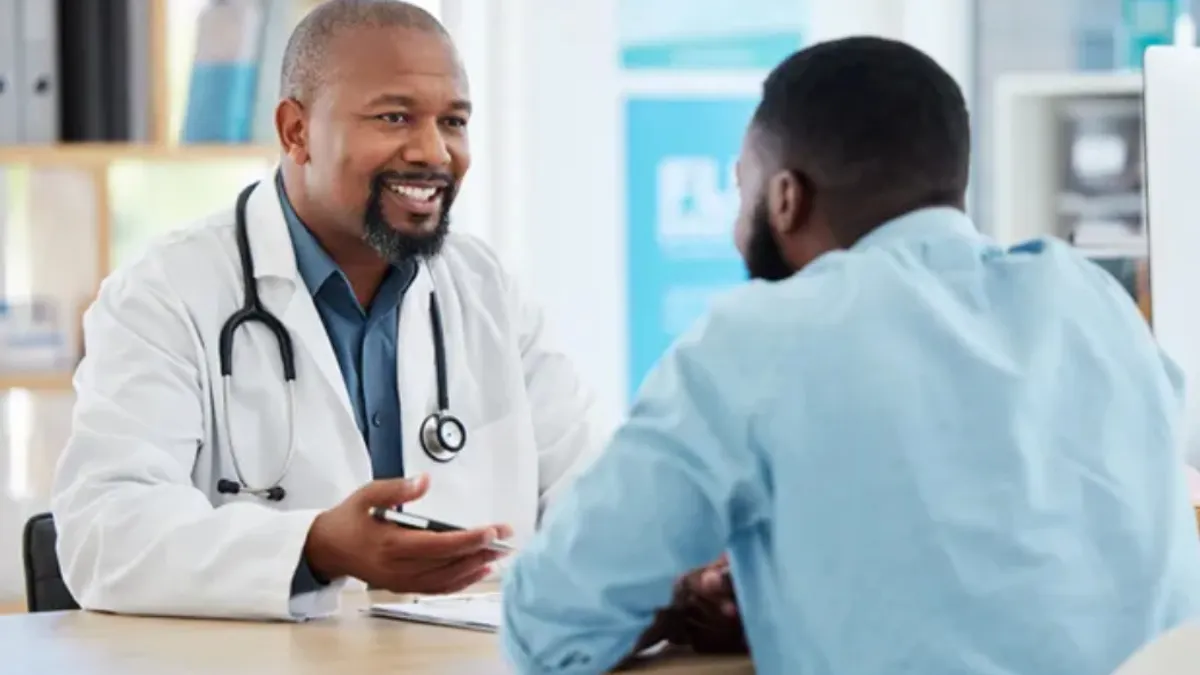 Medical physician talking to his patient.