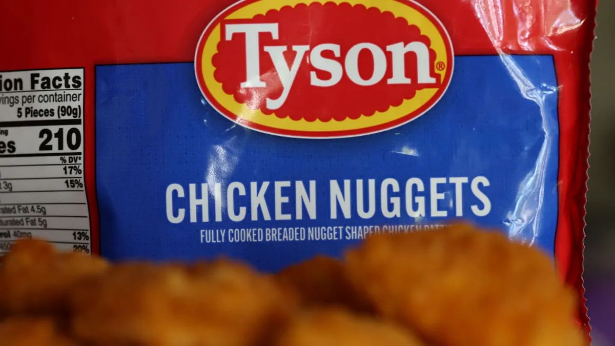 The Tyson logo is seen on a bag of frozen chicken nuggets