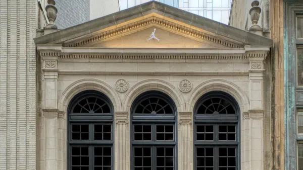 The top portion of a historic building.
