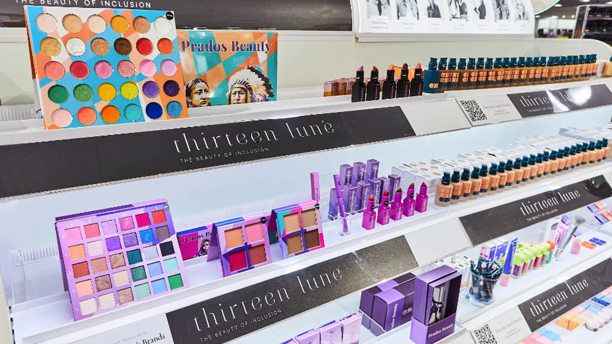 Makeup display of different products from Thirteen Lune.