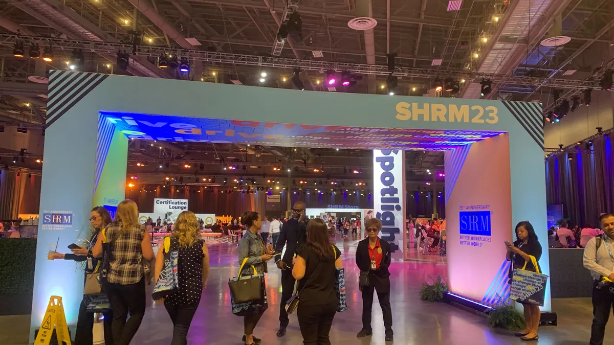 Attendees walk through the SHRM23 conference in Las Vegas.