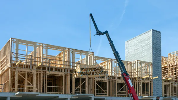 Construction framing of wood building.