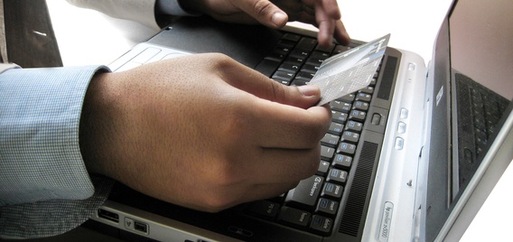 person shopping on laptop