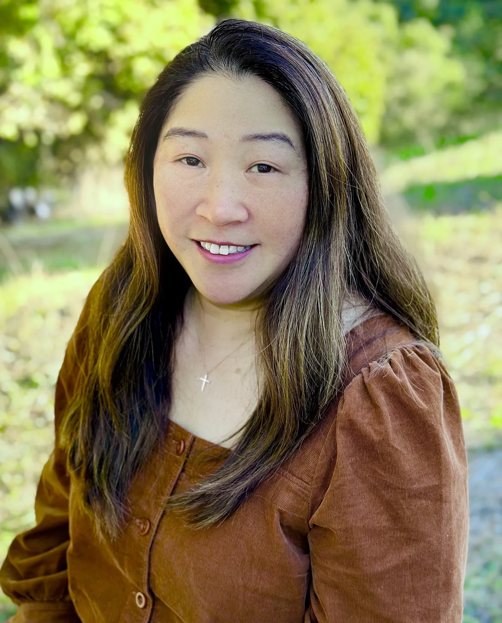 Headshot of Jung-Kyu McCann, chief legal officer at Greenhouse