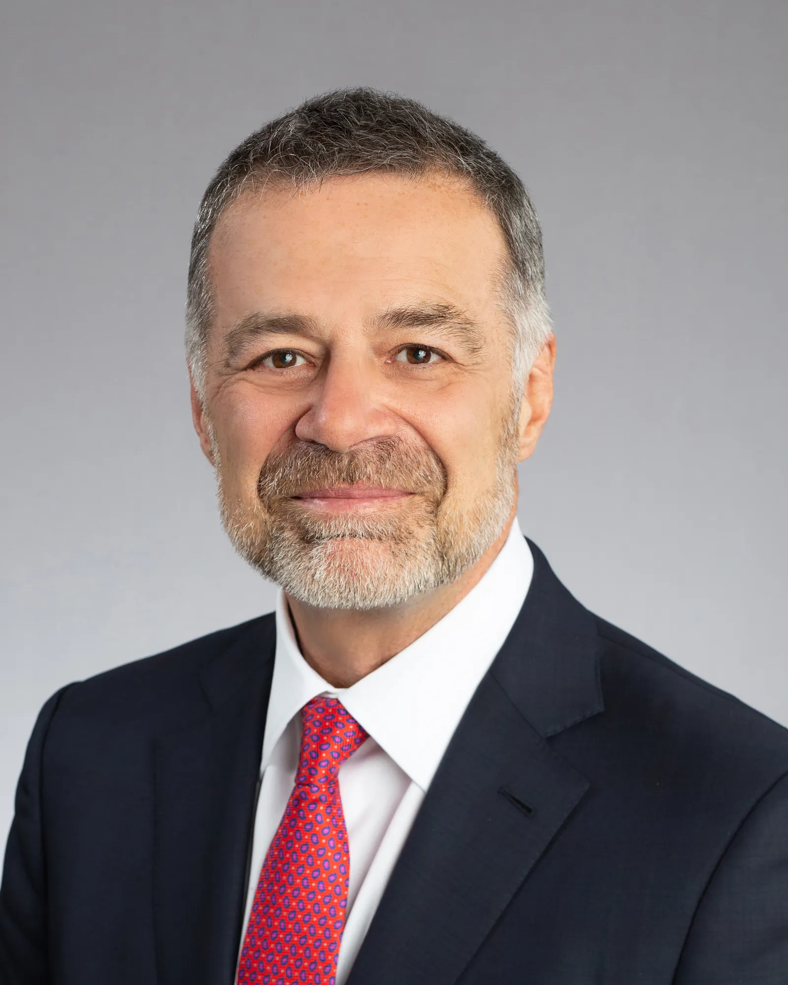 Dark-haired man in suit