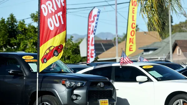 Used cars sit for sale at a Los Angeles dealership.