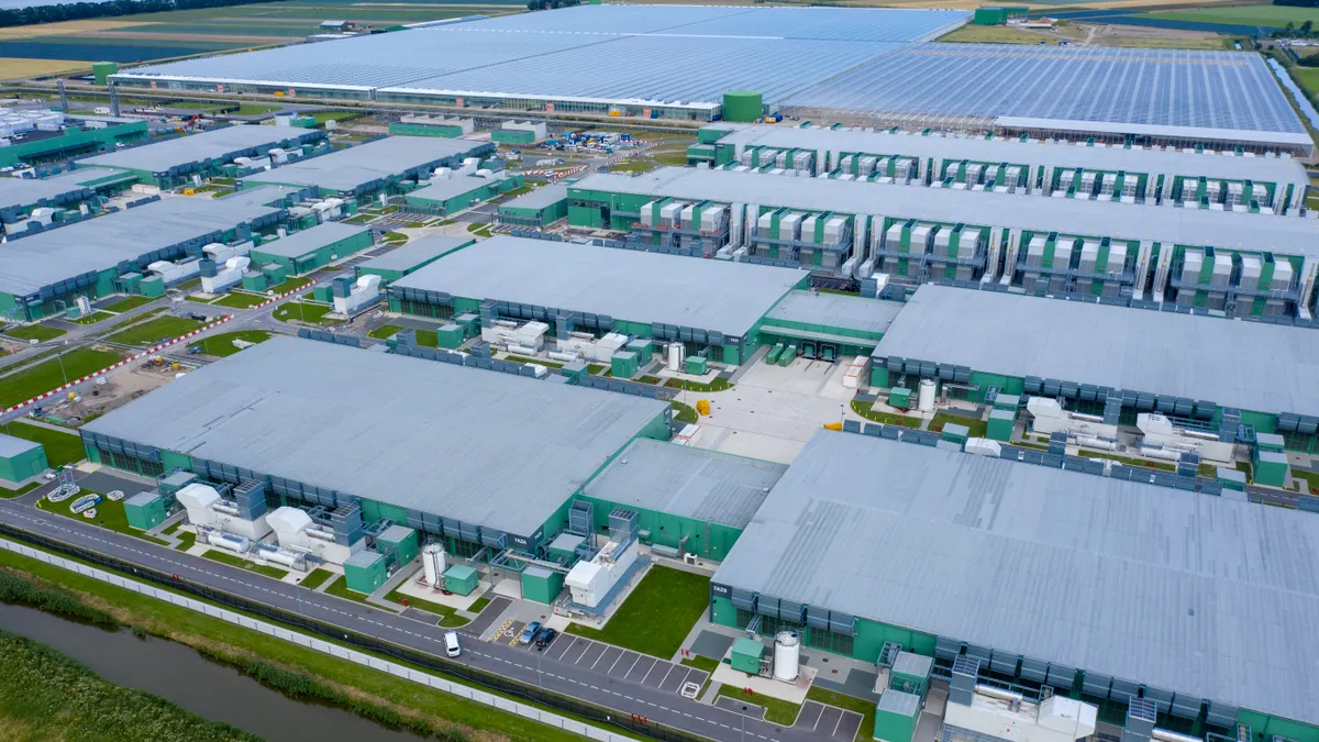 Drone aerial view of Microsoft datacenters  along highway A7 in the province Noordholland near Wieringerwe.