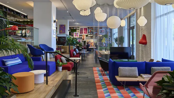 An image shows the lobby at CitizenM Washington, D.C. Georgetown.