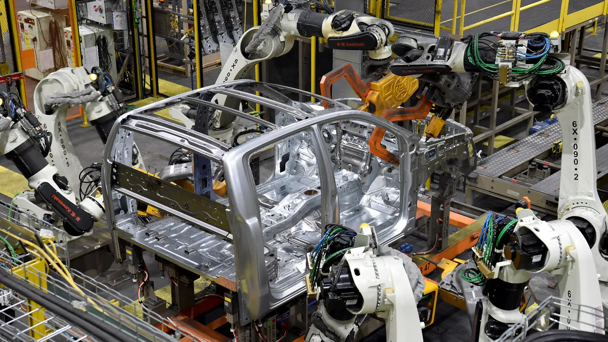 Robots help build a Ford Ranger at the automaker's Michigan Assembly Plant.