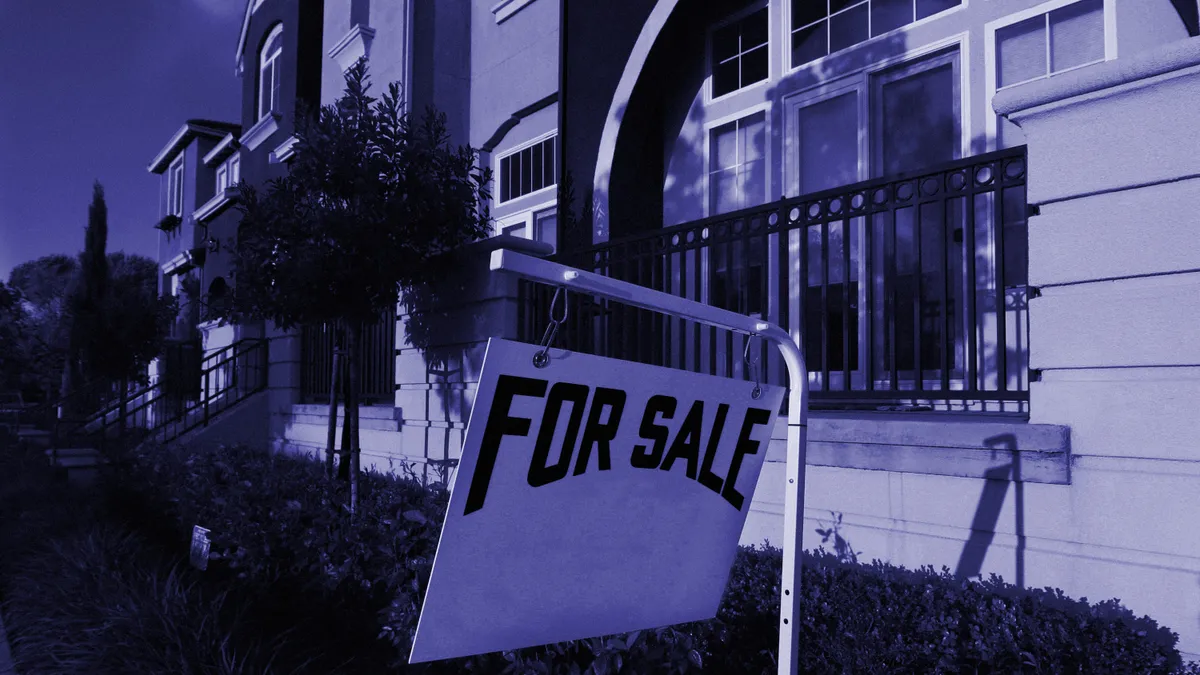 A for sale sign on a home