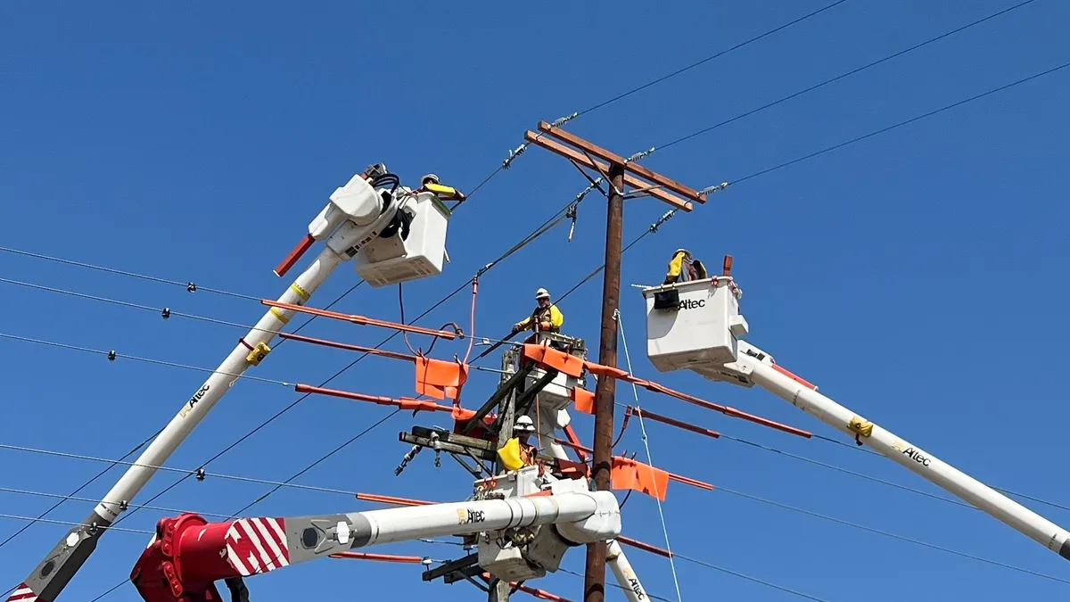 A FirstEnergy crew working on distribution power lines.