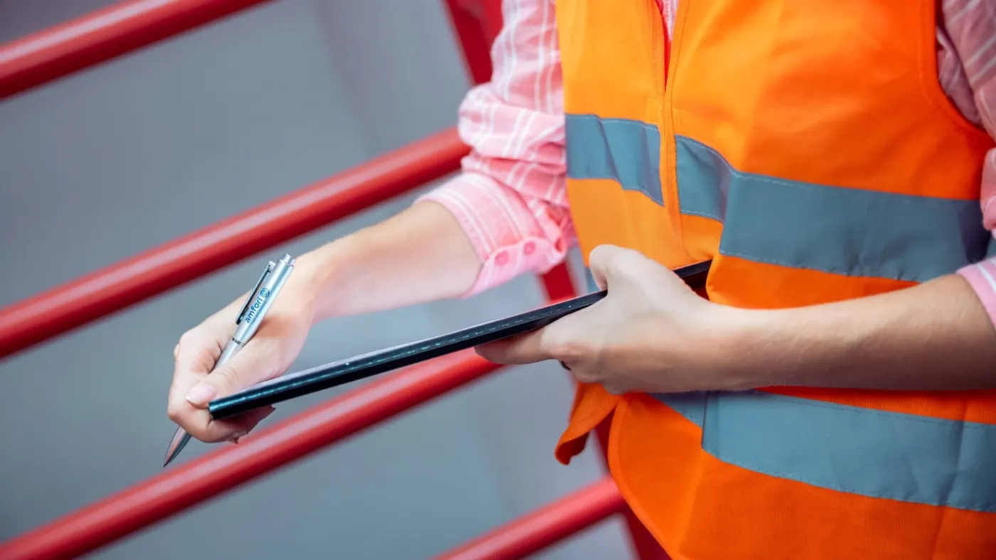 Worker holding tablet