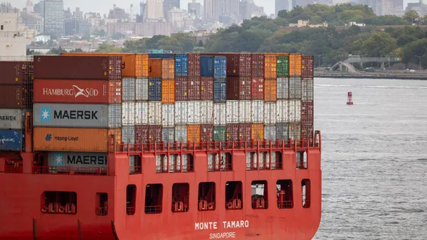 A full container vessel transiting through the New York harbor.