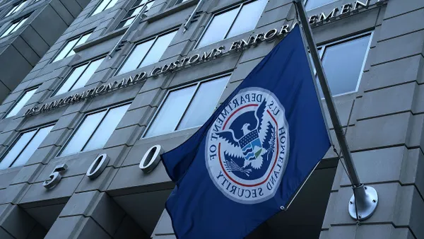 A flag from the U.S. Department of Homeland Security hangs outside the ICE headquarters in Washington, D.C.