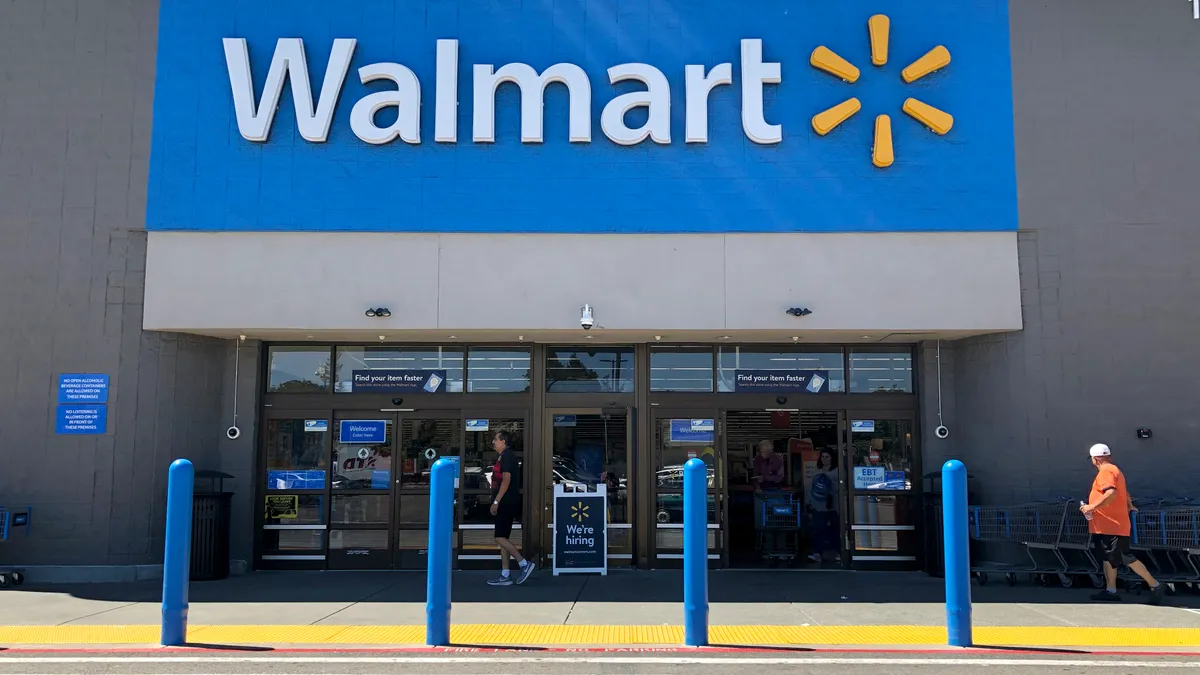 Customers enter a Walmart store in San Leandro, California.