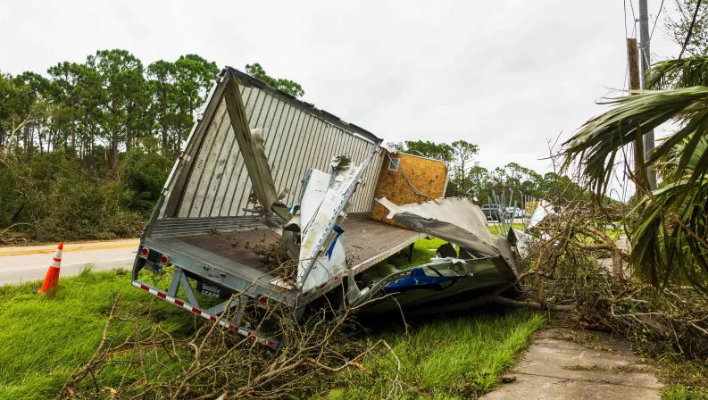 A truck left damaged by a tornado caused by Hurricane Milton, on October 10, 2024 in Port St Lucie, Florida.