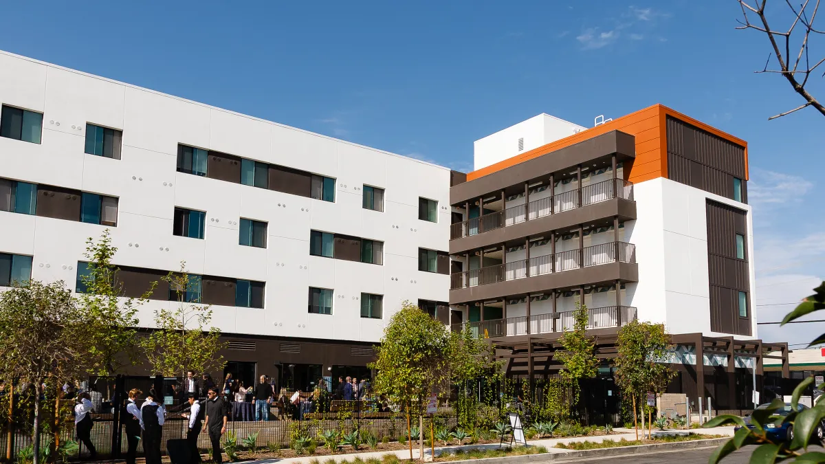 Mid-level, modern multi-colored apartment building