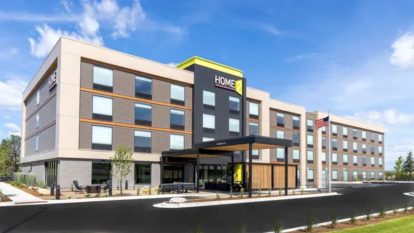 An exterior image of a Home2 Suites by Hilton hotel.